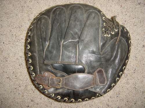 Black Catchers Mitt With White Grommets Back